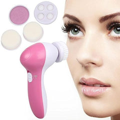 Tarjah Mart 5-in-1 facial beauty care massager showing multiple attachment heads and a sleek handheld design.