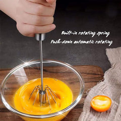 Stainless steel egg and coffee hand mixer by Tarjah Mart, featuring ergonomic handle and durable beaters for kitchen use
