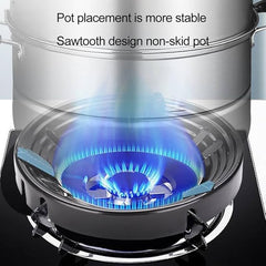 Black gas stove saver pads, 1 pair, designed for kitchen use by Tarjah Mart, placed on a stove surface to protect from spills.