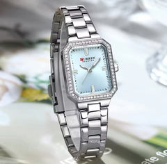 Light blue Curren CUREEN 9102 luxury women's waterproof quartz watch with a sleek design and elegant appearance.