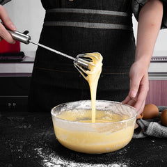 Stainless steel egg and coffee hand mixer from Tarjah Mart with ergonomic handle and beaters for kitchen use