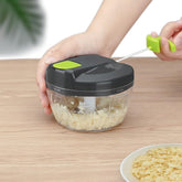 Hand chopper blinder from Tarjah Mart, a kitchen tool for chopping and blending ingredients with a compact design.
