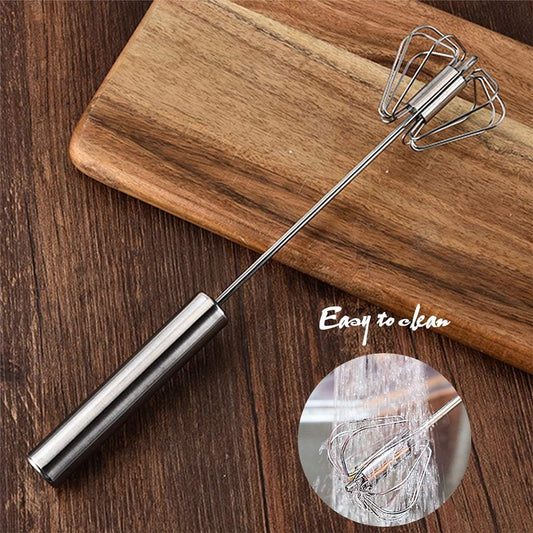 Stainless steel Egg and Coffee Hand Mixer by Tarjah Mart, compact kitchen tool for mixing eggs or coffee in a modern kitchen setting.