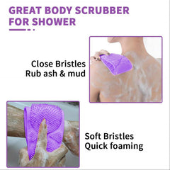 Silicone body scrubber from Tarjah Mart for deep cleaning of skin, featuring a textured surface for effective dirt removal.