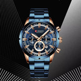 Men's stainless steel Curren 8355 watch with round dial, silver-tone band, and black face featuring chronograph subdials.