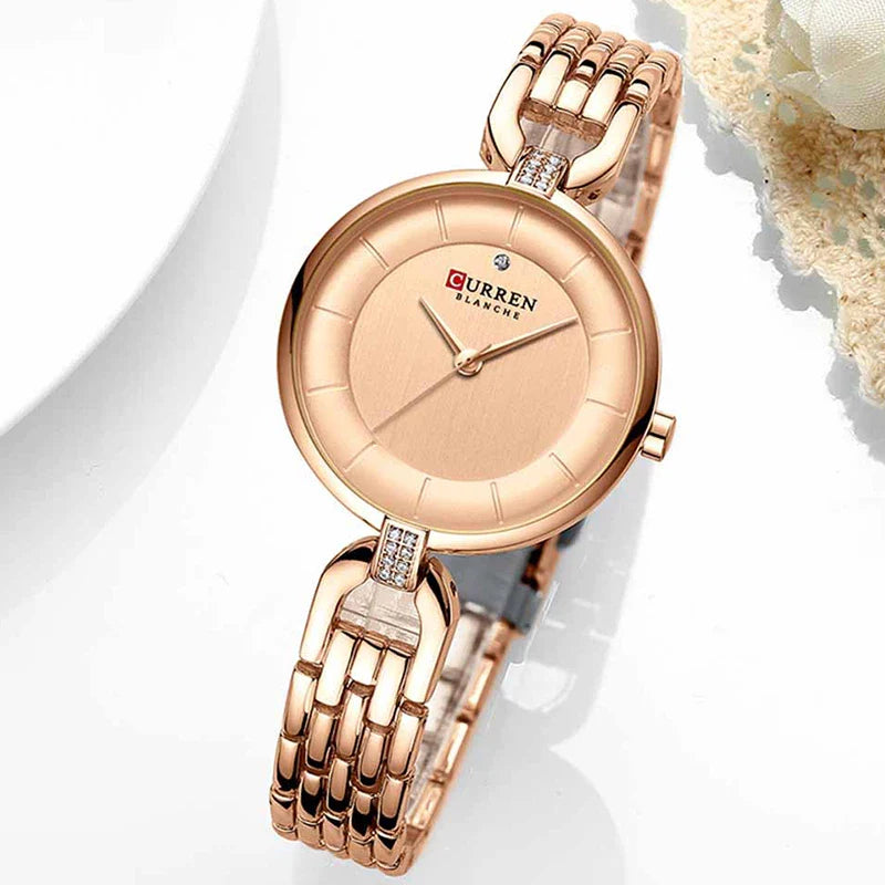 Curren 9052 Ladies luxury women’s watch with a silver-tone band and round dial, elegant and stylish for everyday wear.