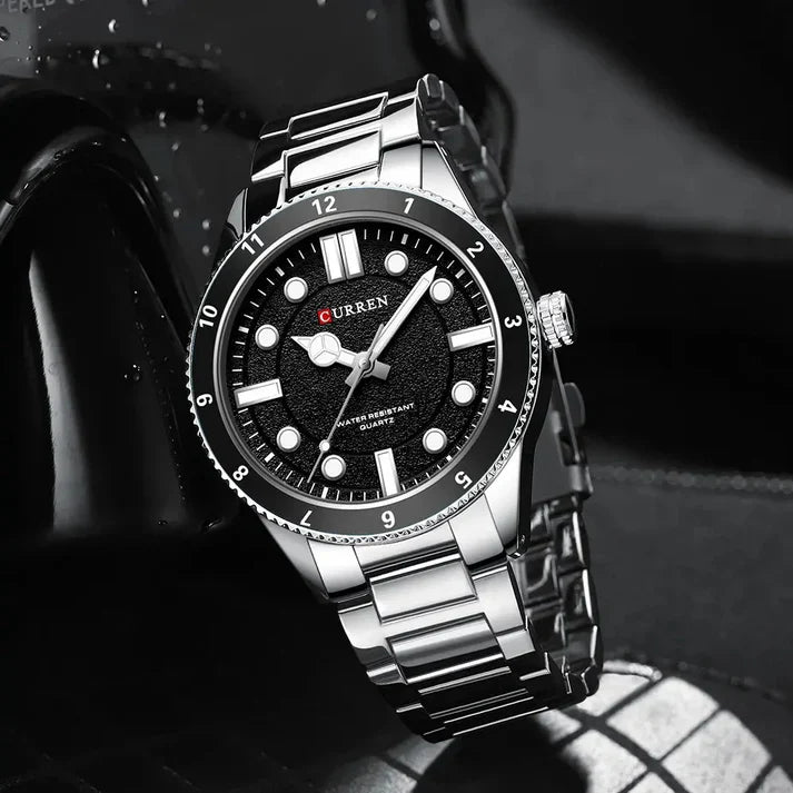 Men's Curren 8450 stainless steel watch with black dial and silver band, showcasing a sleek and modern timepiece design.