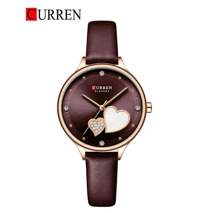 Women’s leather strap watch from Curren 9077 with a sleek round dial and stylish design, perfect for everyday wear.