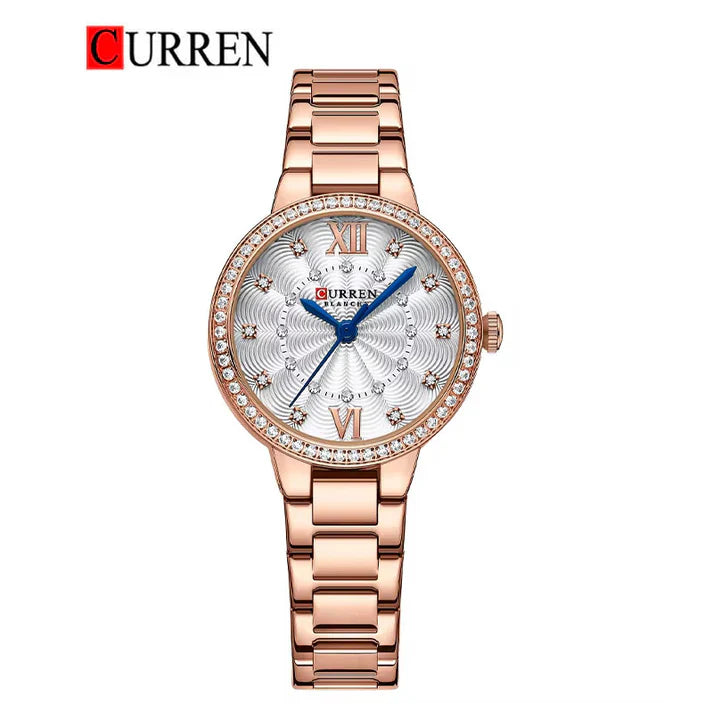 Women's Curren 9085 stainless steel watch with a sleek round dial and silver strap, stylishly displayed on a white background.