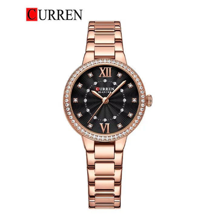 Women's stainless steel watch from Curren 9085 model with a sleek design and round dial, displayed on a white background.
