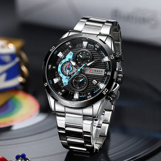 Curren 8402 men's stainless steel watch with black and green dial, black strap, and silver case.