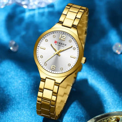Women's Curren 9105 stainless steel watch with a sleek round dial and silver-tone band, stylish and elegant wrist accessory.