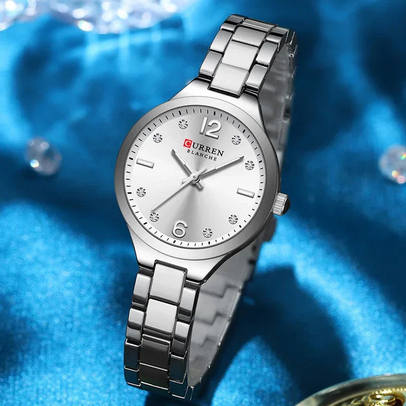 Women's stainless steel watch by Curren, model 9105, with a sleek silver dial and elegant design.