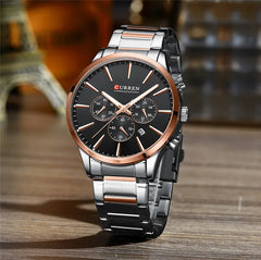 Curren 8435 men's chronograph watch with black dial, silver case, and leather strap, showing time and chronograph subdials.