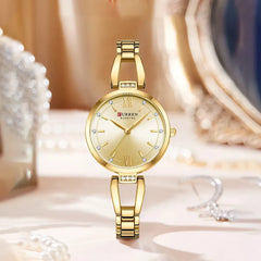 Curren 9092 luxury women's watch with stainless steel band and light blue dial, showcasing an elegant and sophisticated design.