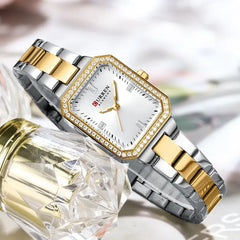 Light blue Curren CUREEN 9102 luxury women's waterproof quartz watch with a sleek design and silver accents.