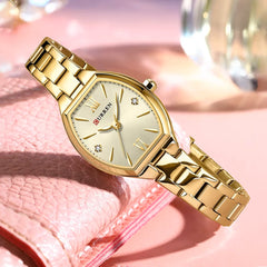 Silver and white Curren 9112 luxury quartz women's stainless steel watch with a sleek design and silver-tone finish.