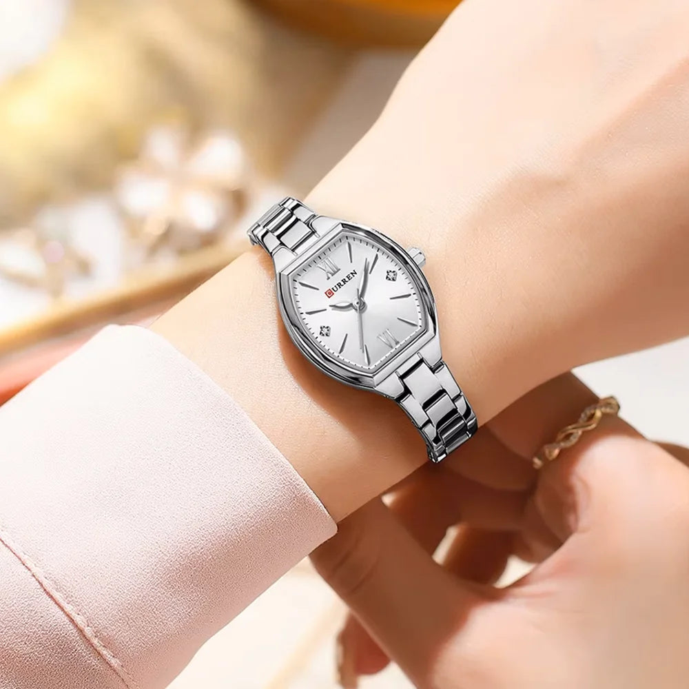 Elegant Curren 9112 women’s luxury quartz stainless steel watch with a silver and white dial and band, stylish and sophisticated.