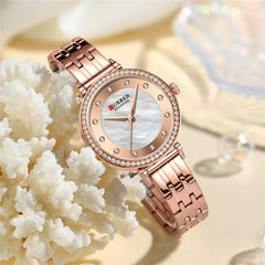 Women's stainless steel watch by Curren, model 9087, with a sleek design and silver-tone finish.