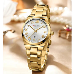 Women's stainless steel watch from Curren 9095 model, featuring a sleek design and silver-tone finish.