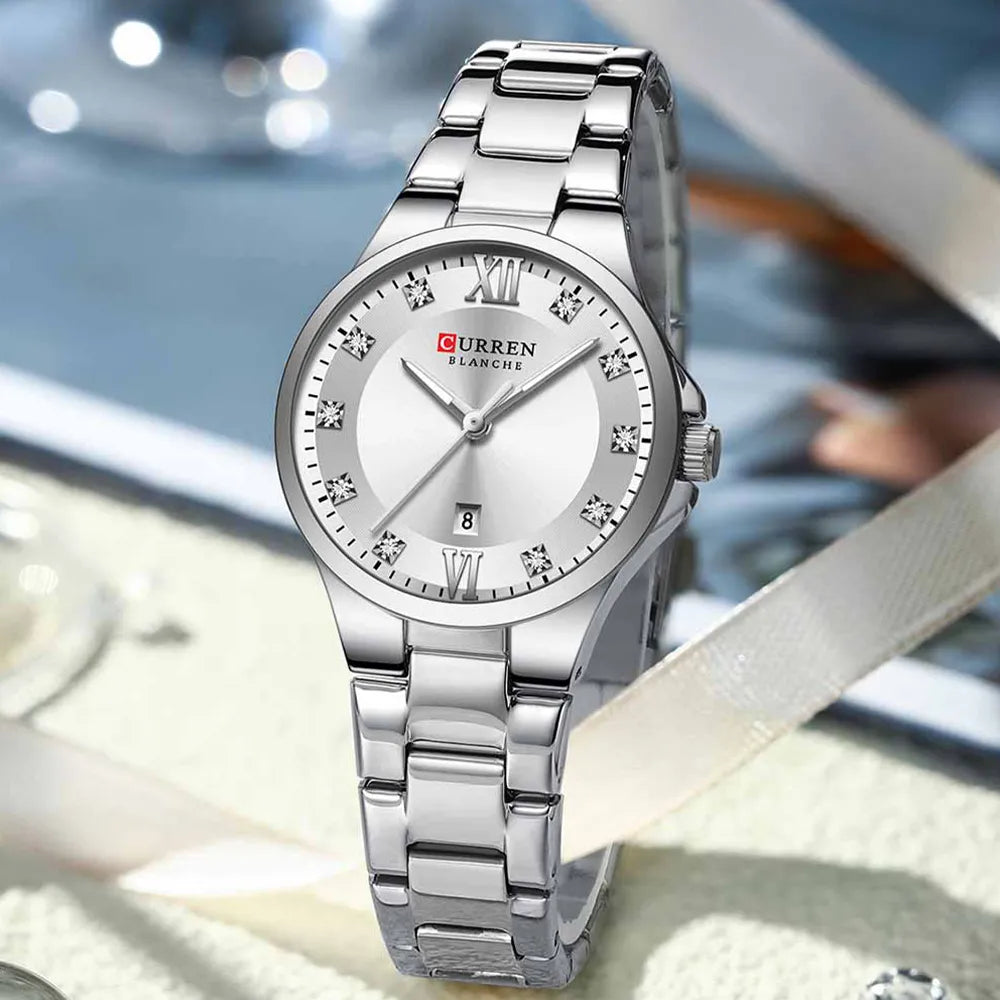 Silver Curren 9107 women's quartz fashion watch with a white dial and stainless steel band, stylish accessory for ladies.