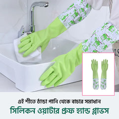Pair of green long hand gloves from Tarjah Mart, ideal for kitchen use, shown laid flat with textured surface.