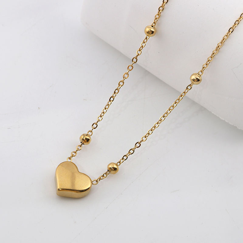 Stainless steel heart necklace from Tarjah Mart featuring a polished heart pendant on a sleek chain.