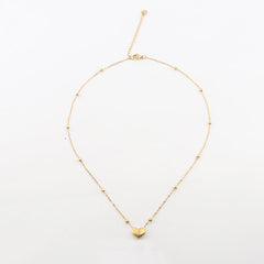 Stainless steel heart necklace featuring a sleek, polished pendant on a delicate chain, designed by Tarjah Mart.