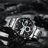 Men's stainless steel Curren 8384 watch with black dial and silver band, stylish men's wristwatch with modern design.