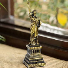 Miniature Statue of Liberty home decor statue by Tarjah Mart, detailed replica for display or decoration.
