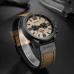 Men's leather strap watch by Curren, model 8314, featuring a sleek round dial and classic design.