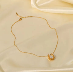 Gold plated stainless steel U-shaped pearl pendant necklace with round pearls, stylish jewelry by Tarjah Mart.