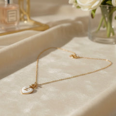 Stainless steel love pearl necklace for women with a channel design, featuring elegant pearls on a sleek chain.