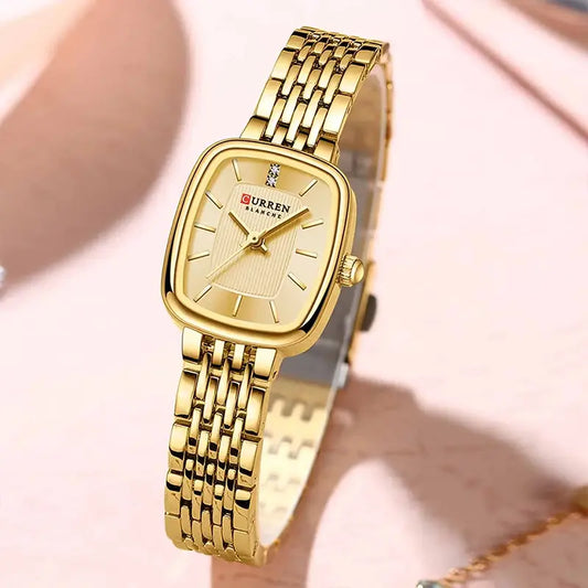 Gold Curren 9093 fashion quartz women’s watch with a round dial and metal band, stylish and elegant accessory.