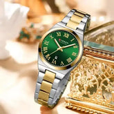 Women's green stainless steel wristwatch by Curren, featuring a stylish round dial and sleek metal strap.