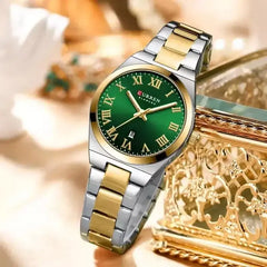 Women's green stainless steel wristwatch by Curren, featuring a stylish round dial and sleek metal strap.