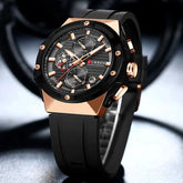 Curren 8462 men's black rubber strap watch showing a black dial with silver accents and a sleek, modern design.