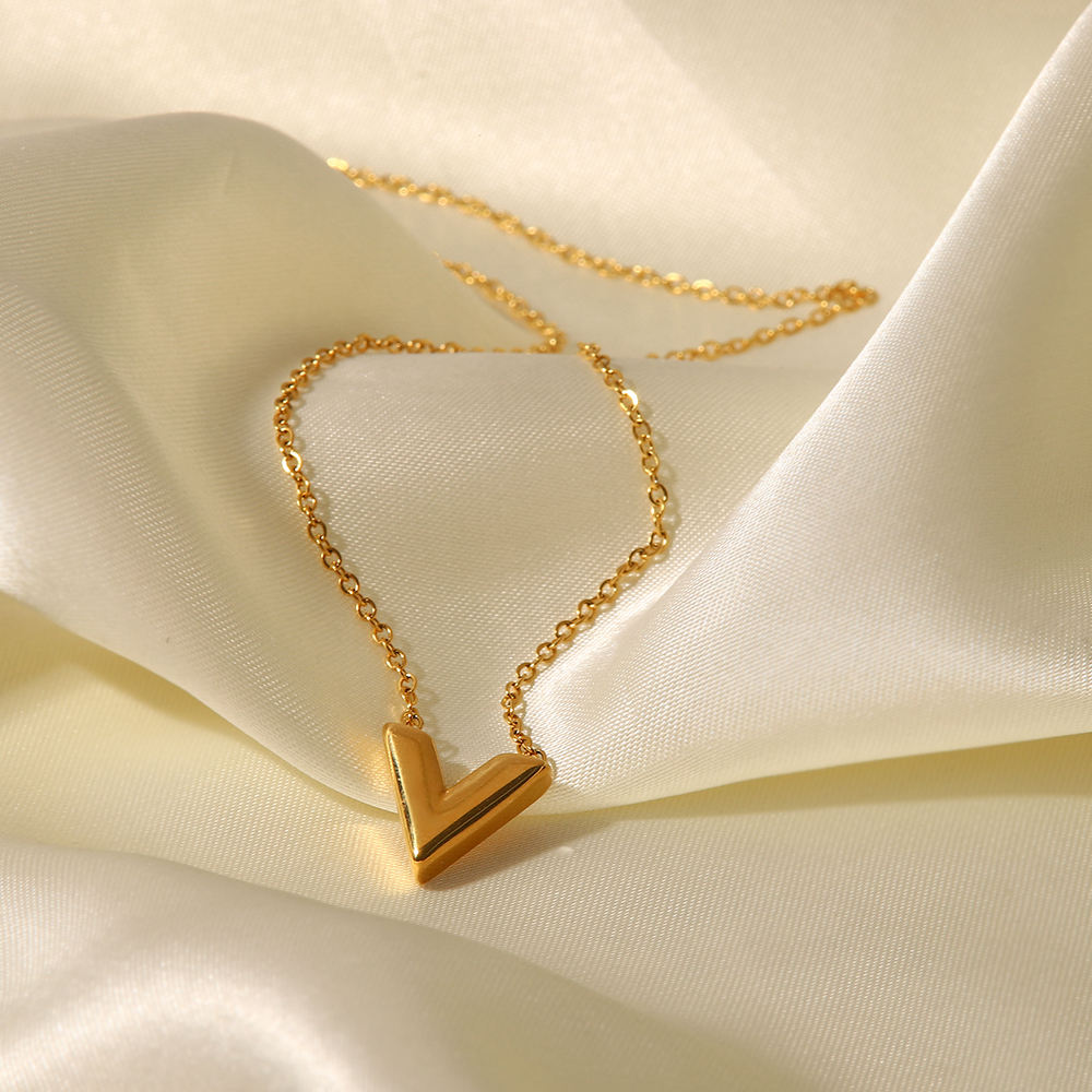 Stainless steel V-shaped luxury pendant necklace for girls with a sleek design, by Tarjah Mart, displayed on a white background.