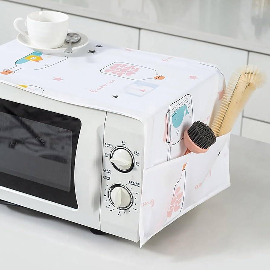 Set of two Tarjah Mart oven covers for kitchen appliances, featuring durable fabric and practical design.