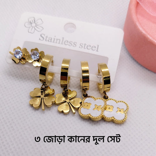 Set of three stainless steel earrings featuring diverse designs, perfect for stylish and versatile ear jewelry by Tarjah Mart.