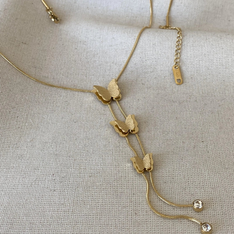 Stainless steel butterfly necklace for women featuring a delicate butterfly pendant with detailed metalwork, stylish jewelry accessory.