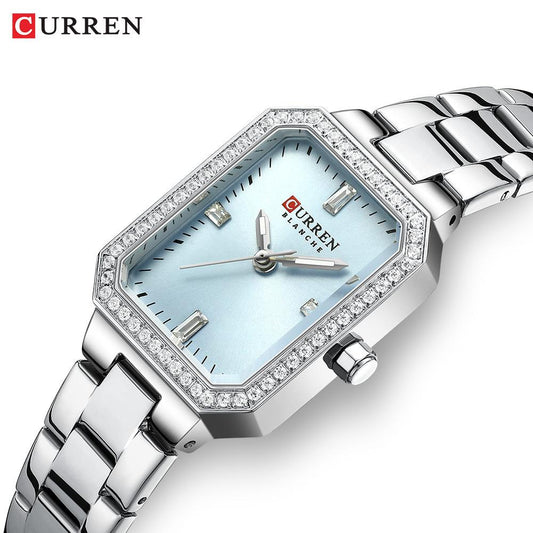 Curren CUREEN 9102 luxury ladies waterproof quartz watch with a light blue dial and strap, showcasing elegant women’s timepiece.