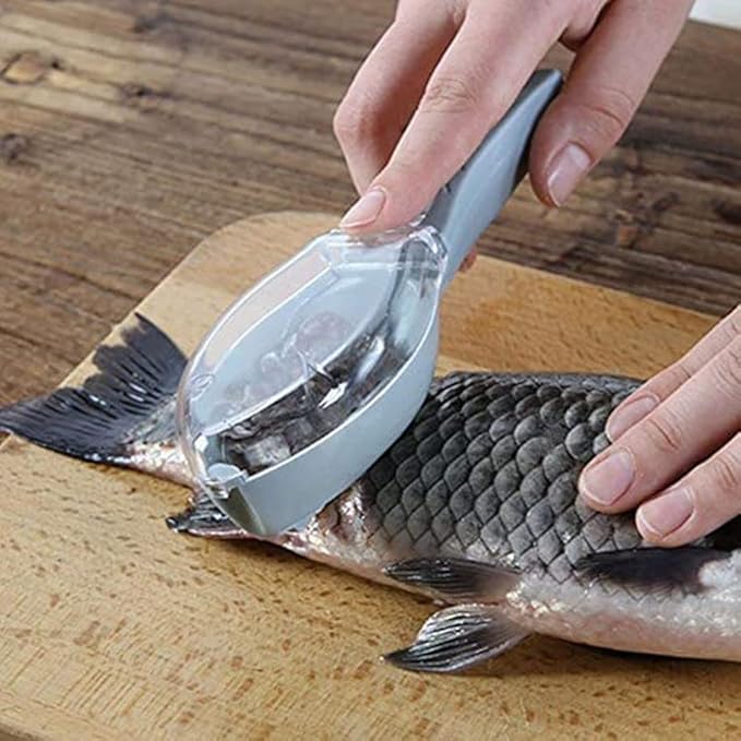 Tarjah Mart fish scales remover with cover, a kitchen tool for efficiently removing fish scales in a compact design