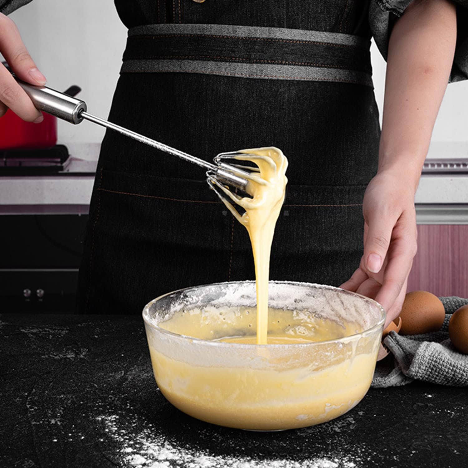 Stainless steel egg and coffee hand mixer from Tarjah Mart with ergonomic handle and beaters for kitchen use