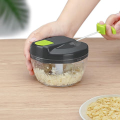Hand chopper blinder from Tarjah Mart, a kitchen tool for chopping and blending ingredients with a compact design.