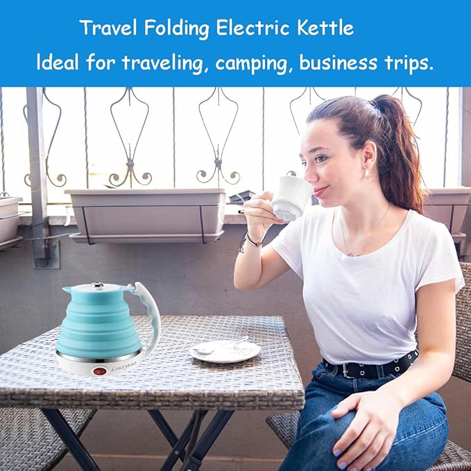 Electric folding kettle by Tarjah Mart, compact electronic kettle with foldable handle for easy storage and pouring.