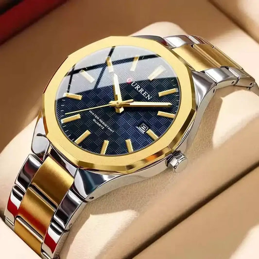Curren 8477 men's quartz watch with a stylish golden and silver design, featuring a round dial and metal bracelet.