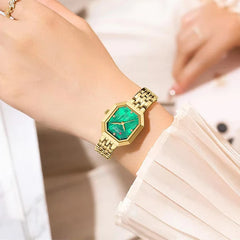 Green Curren 9108 women's fashion stainless steel square watch with a sleek design and metallic band.