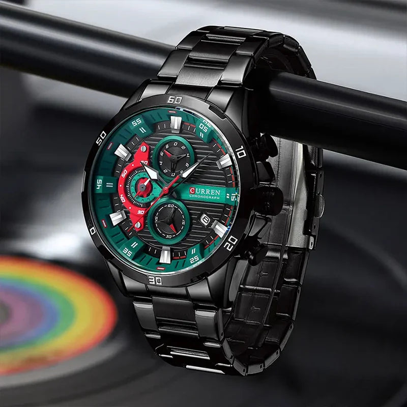Men's CURREN 8402 stainless steel watch with black and green dial, featuring a round face and metal band.
