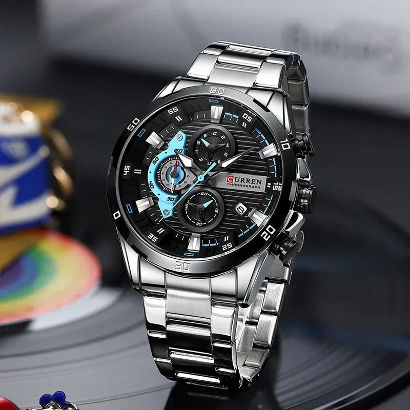 Curren 8402 men's stainless steel watch with black and green dial, black strap, and silver case.